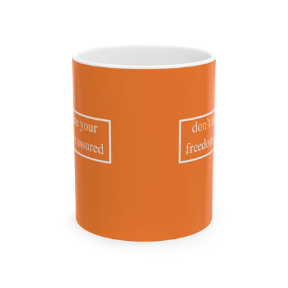 don't assume your freedoms are assured, White font, Orange/White Mug by cypherpunkgear.com