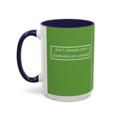 don't assume your freedoms are assured, White font, Green Accent Mug by cypherpunkgear.com