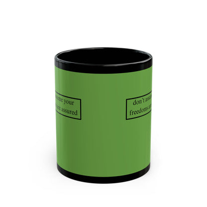 don't assume your freedoms are assured, Black font, Green/Black Mug by cypherpunkgear.com