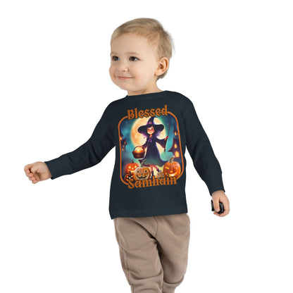 Blessed Samhain Little Witch Orange font Toddler Long Sleeve Tee by CreepyCrafts.boo