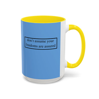 don't assume your freedoms are assured, Black font, Light Blue Accent Mug by cypherpunkgear.com
