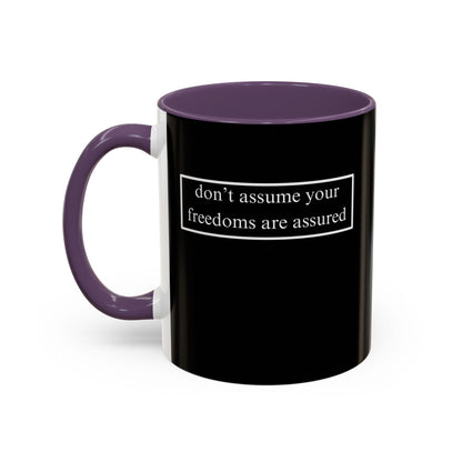 don't assume your freedoms are assured, White font, Black Accent Mug by cypherpunkgear.com