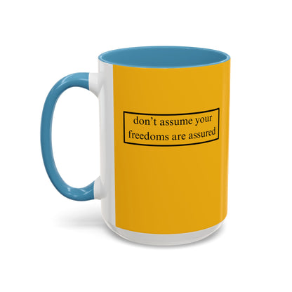 don't assume your freedoms are assured, Black font, Yellow Accent Mug by cypherpunkgear.com