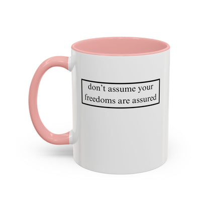 don't assume your freedoms are assured, Black font, White Accent Mug by cypherpunkgear.com