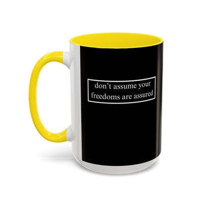 don't assume your freedoms are assured, White font, Black Accent Mug by cypherpunkgear.com