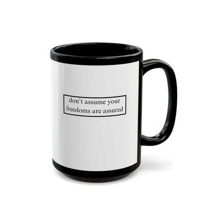 don't assume your freedoms are assured, Black font, White/Black Mug by cypherpunkgear.com