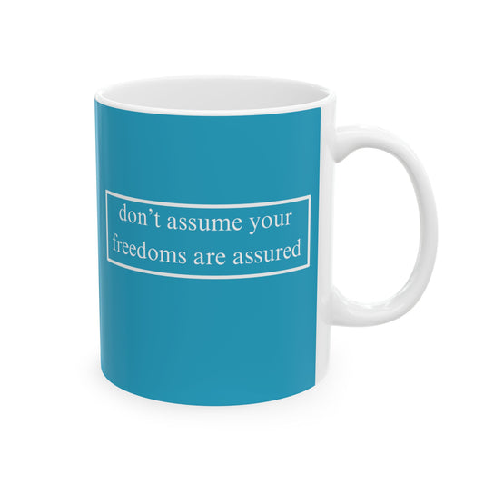 don't assume your freedoms are assured, White font, Turquoise/White Mug by cypherpunkgear.com
