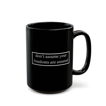 don't assume your freedoms are assured, White font, Black Mug by cypherpunkgear.com
