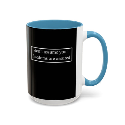don't assume your freedoms are assured, White font, Black Accent Mug by cypherpunkgear.com