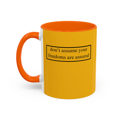 don't assume your freedoms are assured, Black font, Yellow Accent Mug by cypherpunkgear.com