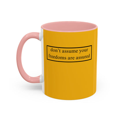 don't assume your freedoms are assured, Black font, Yellow Accent Mug by cypherpunkgear.com