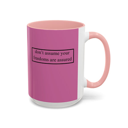 don't assume your freedoms are assured, Black font, Pink Accent Mug by cypherpunkgear.com