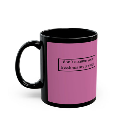 don't assume your freedoms are assured, Black font, Pink/Black Mug by cypherpunkgear.com